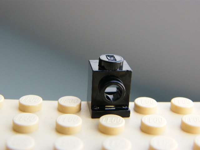 LEGO 4070 - Black Brick, Modified 1 x 1 with Headlight