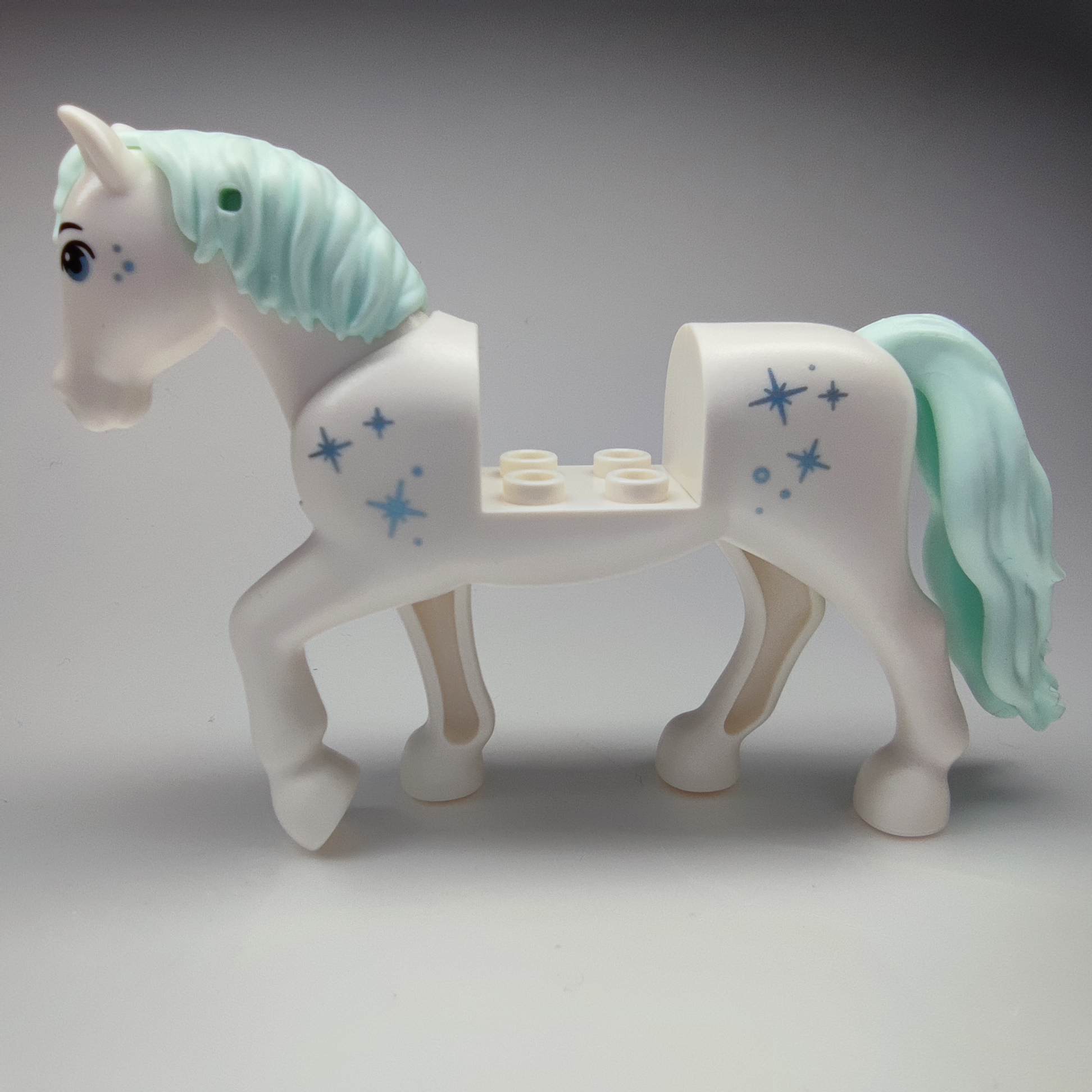 LEGO 76950c01pb01 Horse with 2 x 2 Cutout and Movable Neck, Light Aqua Tail and Mane, Metallic Light Blue Eyes and Stars Pattern