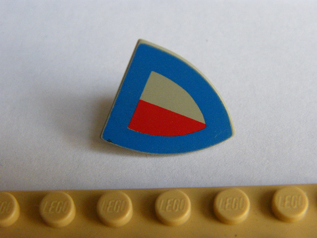 LEGO 3846p47 Minifigure, Shield Triangular with Red/Gray Halves and Blue Border Pattern